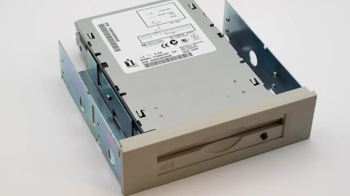 Old internal Zip drive for data storage, emphasizing retro tech appeal.