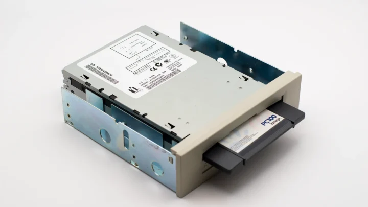 An old-fashioned PC100 data backup drive with a removable diskette, showcasing retro computing hardware.