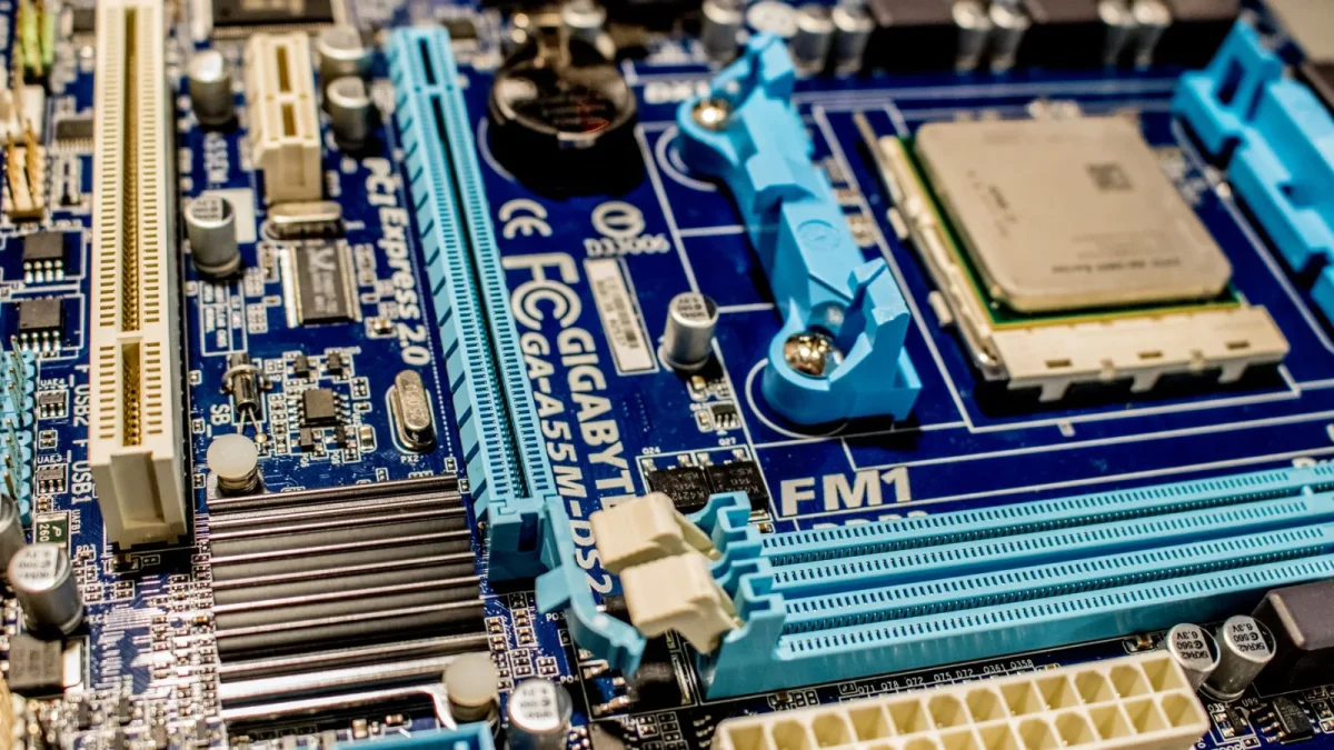 Detailed close-up image of a computer motherboard showcasing various electronic components.