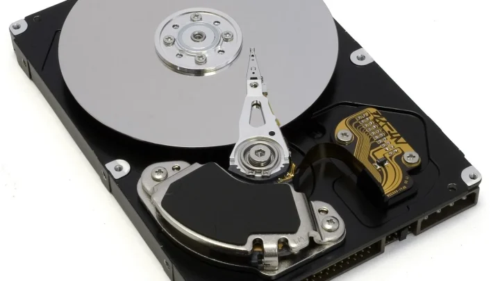 open hard drive, visible plate and reading head, writing, digital, memory, flash, storage material, external hard drive,