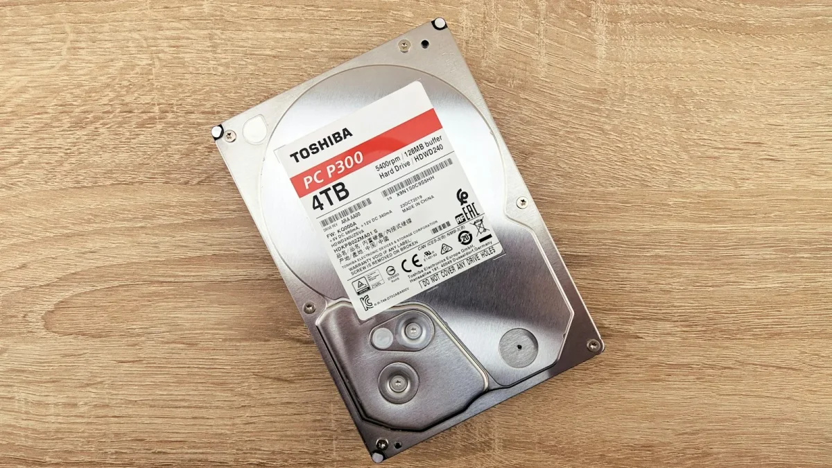 a hard drive sitting on top of a wooden table