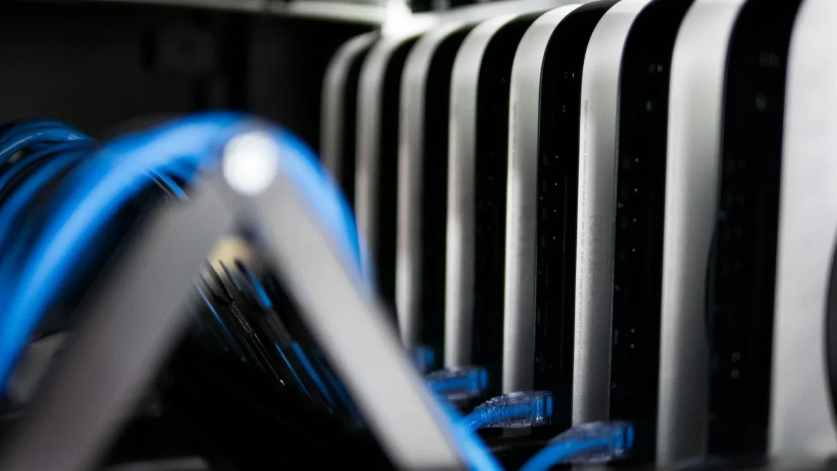 a close up of a bunch of wires in a rack
