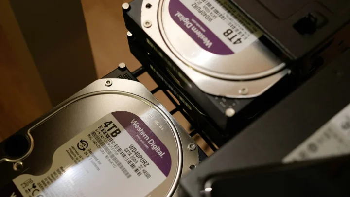 two hard drives are stacked on top of each other