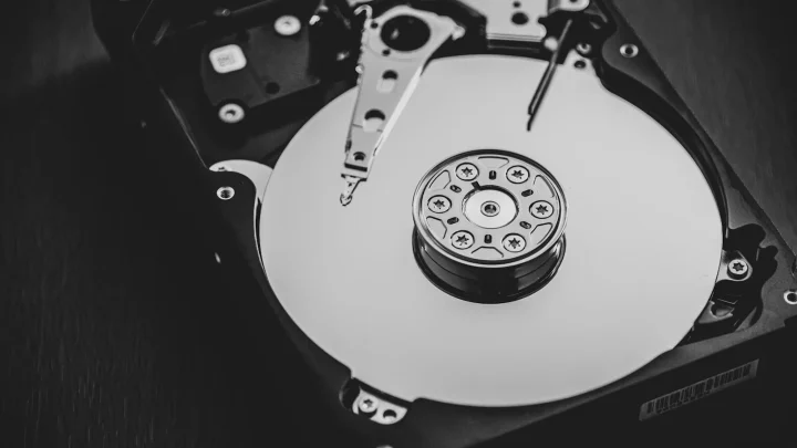 white and silver hard disk drive